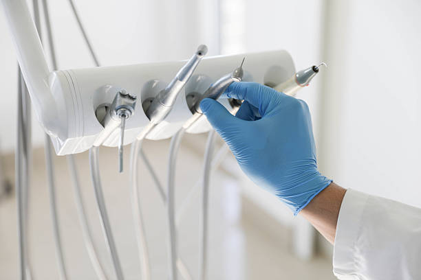 Professional Tooth Extraction technician working in Cincinnati, OH